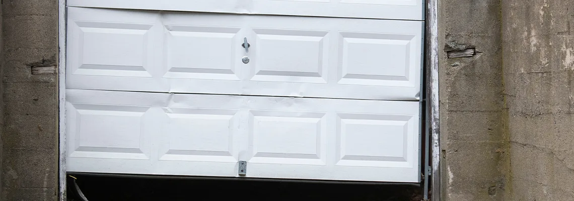 Garage Door Got Hit By A Car Dent Removal in Bolingbrook