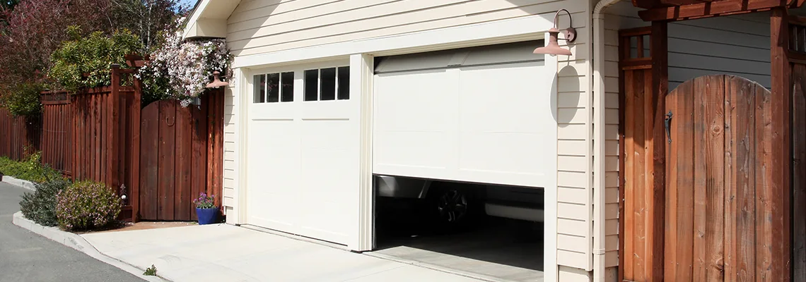 Fix Metal Garage Door Jerking in Bolingbrook